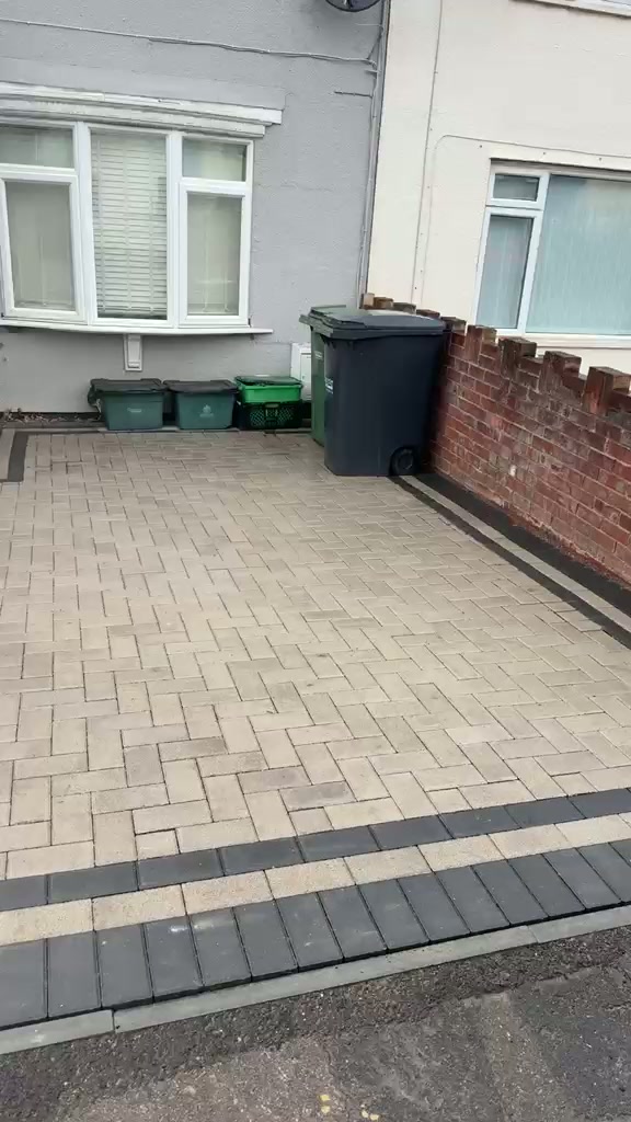 Video walkthrough of a buff block paved driveway with charcoal double border in Gloucester